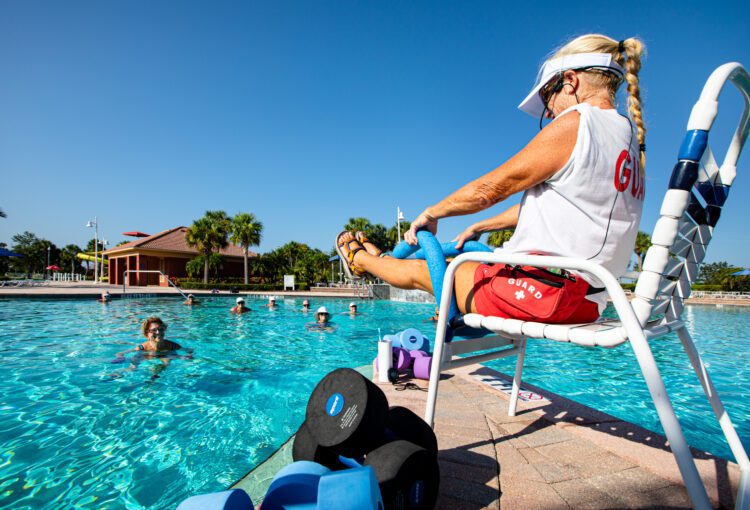 Kellie Powell teaches swim lessons at Ave Maria Water Park