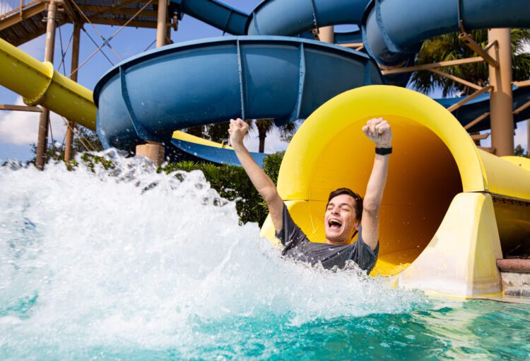Ave Maria resident enjoys the water slide