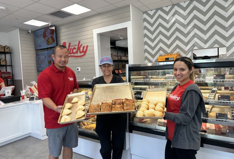 Vicky Bakery franchisee owner, Ohong Ho, with staff