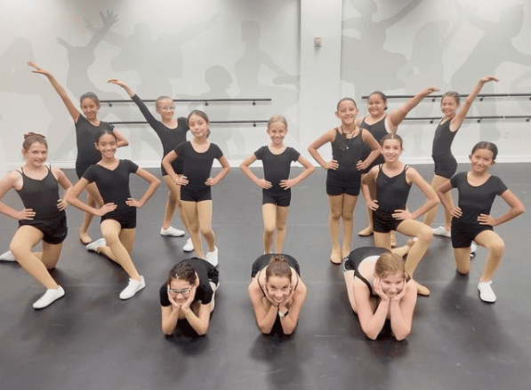 Group of girls posing at dance class