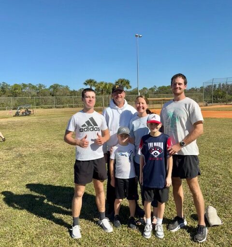 Ave Maria Little League players with parents at 2024 Wiffleball Tournament