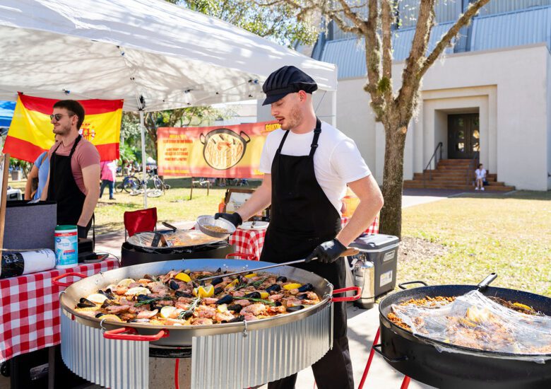 Man cooks fresh paella at the 2025 Taste of Ave