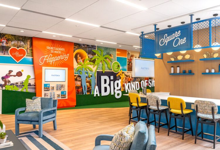 Seating area, information wall and coffee bar in Ave Maria Welcome Center