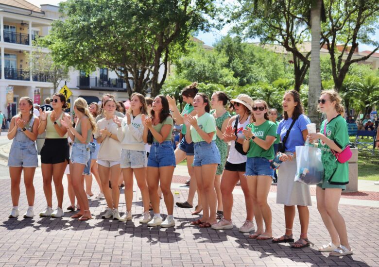 Ave Maria University students cheer and dance to live music by The Crows at the Shamrock Festival