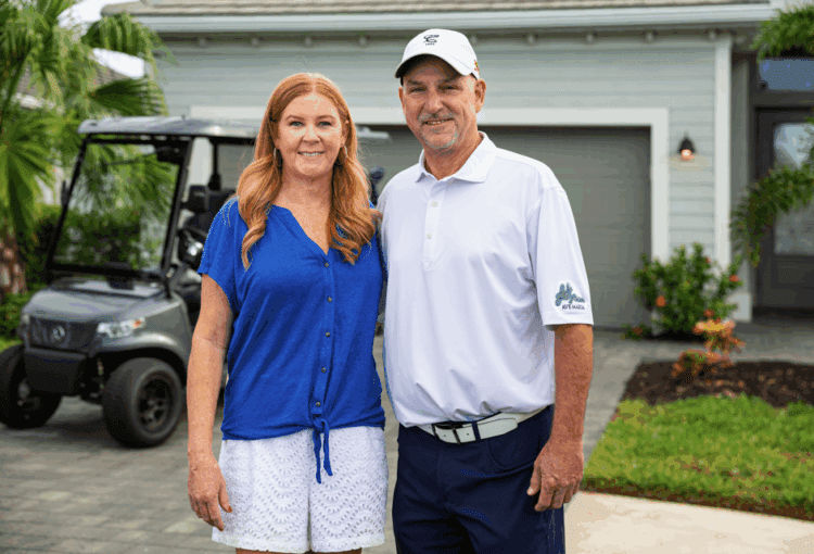 Taggart couple in front of their Lennar home in Ave Maria