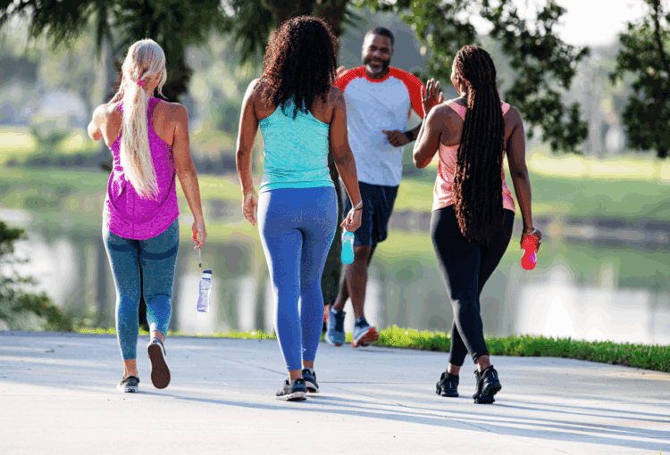 Residents walking the paths in Ave Maria