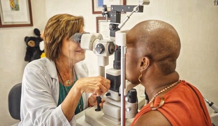 Dr. Del Toro examines patient at Ave Maria Optical