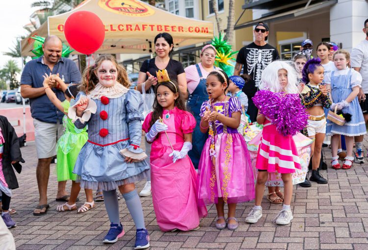 Children and tweens line up for judging for costume contest