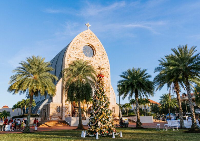 Ave Maria Catholic Church with Town Center Christmas Tree in foreground