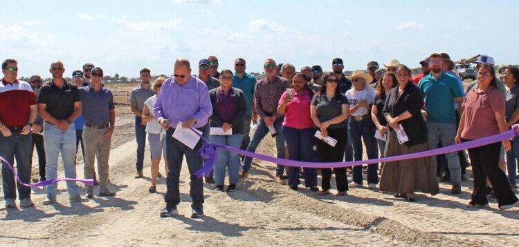 A residential street in Ave Maria’s Gatherpoint neighborhood has been renamed Smith Street in recognition of Tammy Smith, a longtime team member of Ave Maria Utility Company (AMUC). The dedication took place on February 22, marking one year since her passing, with colleagues, friends and family gathering to honor her contributions. Tammy was part of AMUC from its early days in 2007, working in customer relations and development support as the community continued to grow. Known for her knowledge and reliability, she worked closely with builders, consultants and development partners to help keep projects moving forward. “She was our go-to person,” said development coordinator Danielle Turrubiartez. “She had the answers and was someone everyone relied on.” Her work played a steady role in supporting the infrastructure behind Ave Maria’s growth. Renaming the street reflects the impact she had over the years and the respect she earned within the organization and broader community. Outside of her day-to-day role, Tammy was also interested in creating more opportunities for local students. That idea is now continuing through the Tammy Smith Immokalee Foundation Legacy Scholarship. The program offers paid internships for Immokalee High School students, giving them exposure to different areas of AMUC, from engineering to customer service. The street dedication included the unveiling of a handcrafted sign made by the AMUC plant team. Attendees, including her husband Brent, gathered for a simple ceremony to recognize her time with the company and the role she played in Ave Maria’s development. While the work she contributed continues behind the scenes, the naming of Smith Street offers a visible reminder of someone who helped support the community from the start.